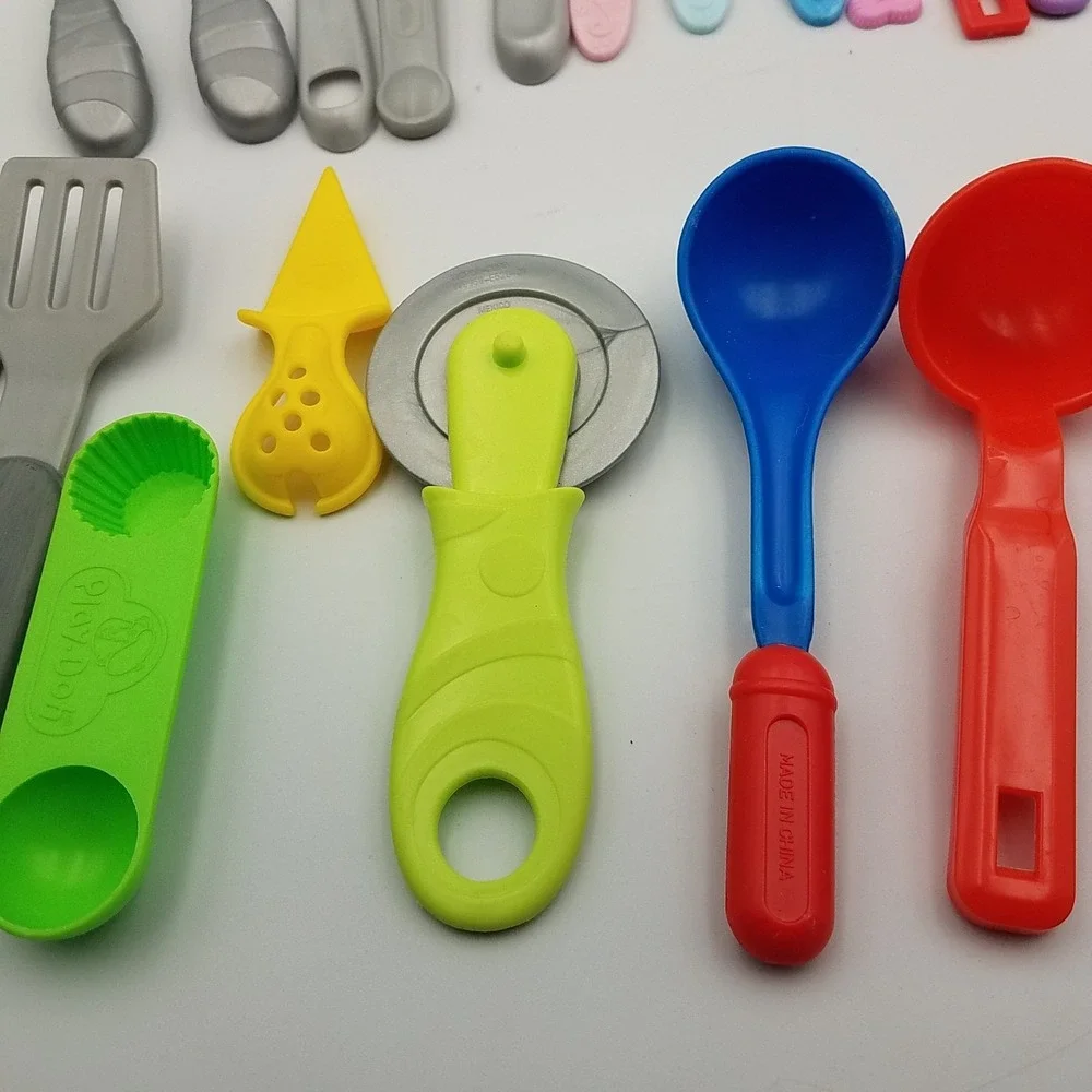 Childrens mixed lot play utensils Foks Spoons Knives Spatulas Ladels Turners Mis